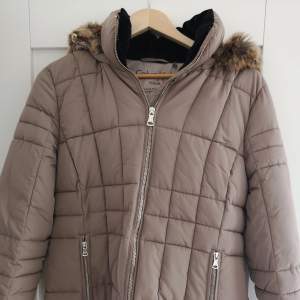 Brand new winter jacket. I have not used it even once, so it is like new. It very warm, classy and comfortable. 