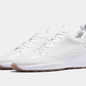  - Steel Runner Shark in Gum White by exclusive Dutch brand ' Filling Pieces ' . A casual, off white sneaker made with the highest quality leather and construction. Feels solid to touch and really comfy on foot.  Brand new. Haven't used it at all after buying, realised it's not really my style. My loss, your gain.  Size is really a 43-44 EU, if you have those sizes, it will fit perfectly.  Bought from Opumo.com at 220 EUR . Letting go at half price.   // common projects , sweyd , cqp , coloquy , axel arigato , etq , buttero