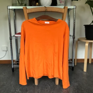 Långärmad tröja - Snygg, lysande, loose-fit tröja.