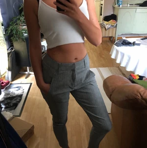 Rutiga kostymbyxor  - Rutiga helt oanvända kostymbyxor.