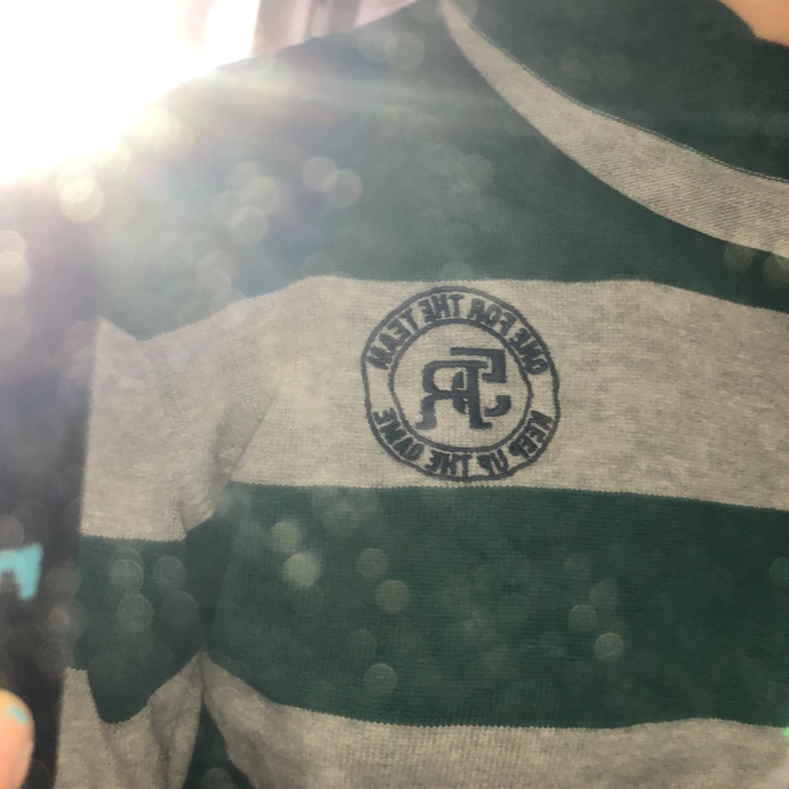 Randig polotröja med ficka - 91