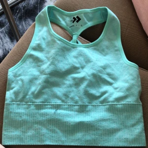 Tränins topp  - Tränins topp oanvänd !:) Turkos färg 