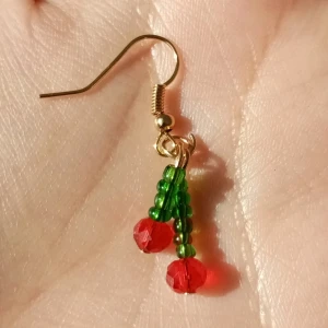 cherry earrings  - handmade cherry earrings 🌿☮️🍒.                                                         frakt : 15kr, om du köper mer än 75 kr då är det gratis :).           DM if you're interested, DM om du är intresserad 💌