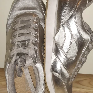 Silver color - 3-5 times used and bought in the Philippines.