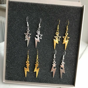 Örhängen  - Örhängen med blixt och liten eller stor stjärna! Både i guld och silver💕 59kr/par! Finns mer på instagram: s.byelsa