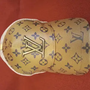 Louis Vuitton keps. Made in France. Bra skick.
