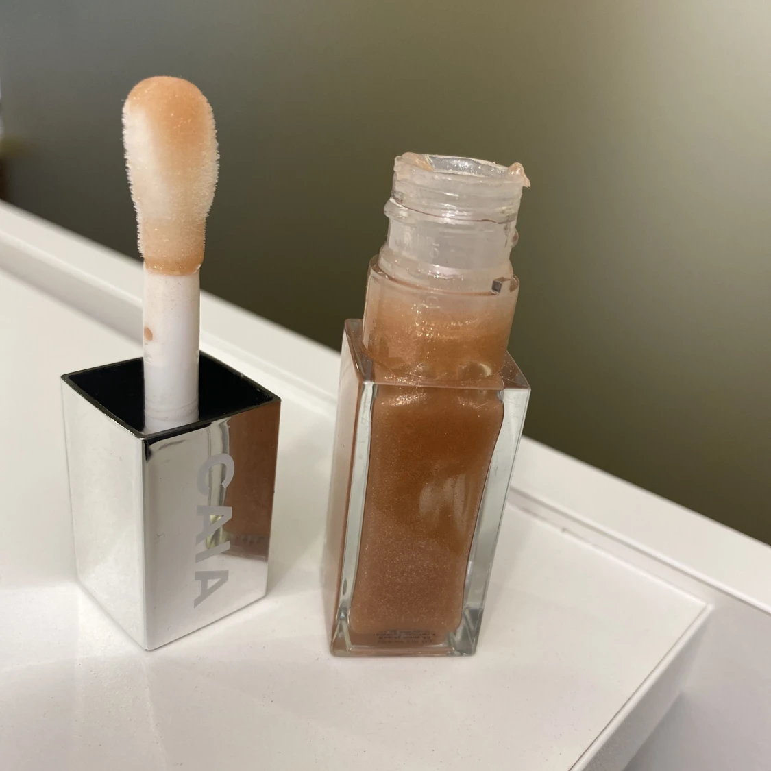 Caia läppglans  - 90