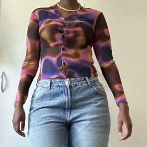 Två mesh toppar - Färg: multicolored Storlek: 38