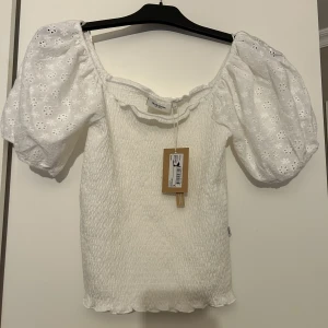 Topp - Helt ny topp, ord pris 400 