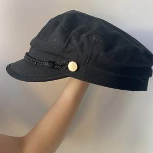 En enkel svart brixton hatt