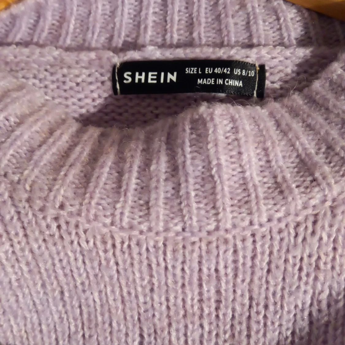 Lila stickad tröja - 91