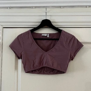 Topp Asos - Ljuslila topp från Asos i storlek 38