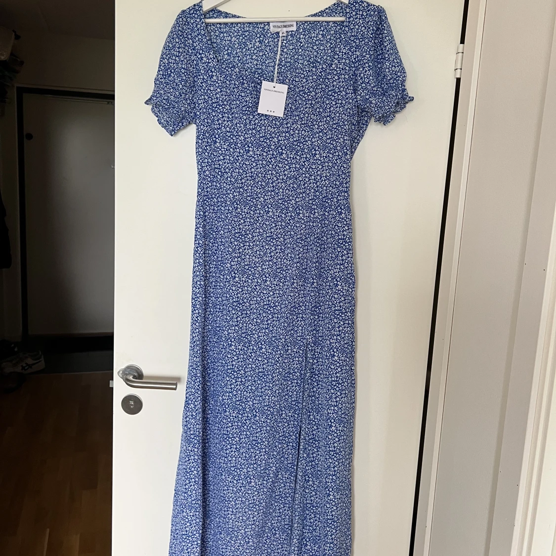 Lång blåvit klänning  - 91