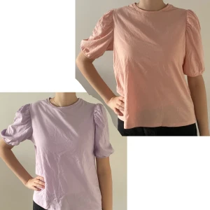 T-shirts med puffärmar från lager 157 - 2 T-shirts med puffärmar från lager 157 i storlek M. Använd fåtal gånger därav nyskick. Köp 1 för 75kr eller båda för 125kr. Säljer pga att de inte kommer till användning. 