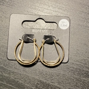 Gulda örhängen  - Oanvända örhängen 