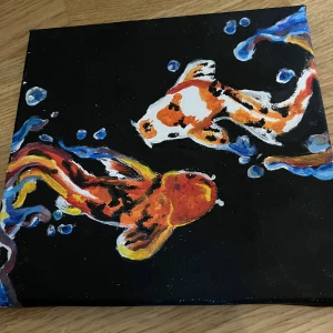 Tavla - En tavla på koi fiskar målade av mig. 