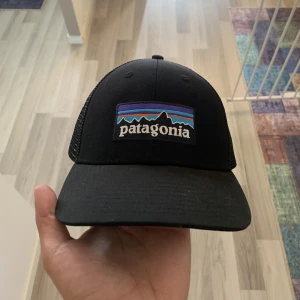 Patagonia keps - Svart Patagonia keps endast testad!!! One size unisex.