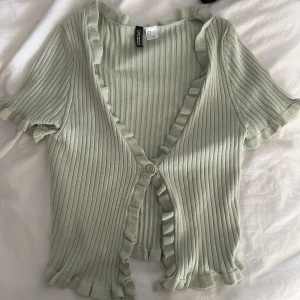 Söt kofta - En söt grön kofta, använd 2 gånger💗