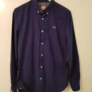 Lacoste skjorta - Nästan oanvänd! Storlek 40