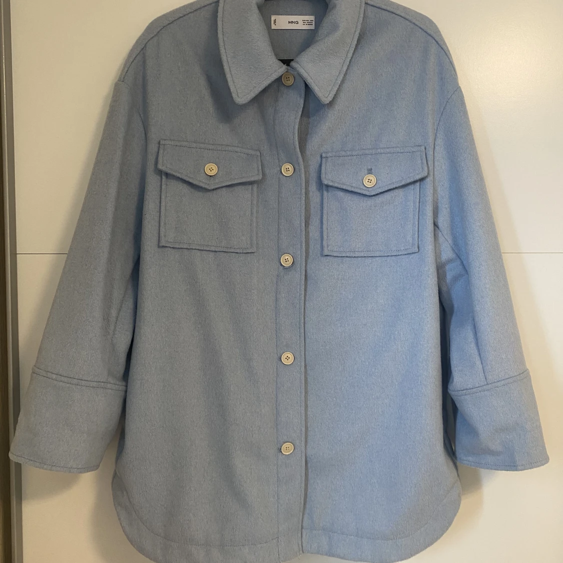 Ljusblå skjortjacka