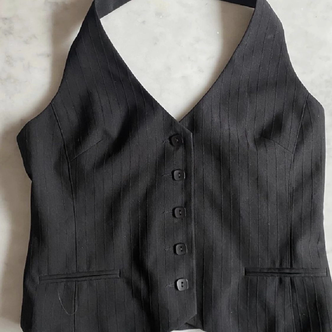 Kostymväst