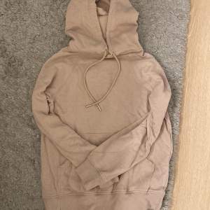 Ljusrosa/beige hoodie från H&M inga defekter alls! Super fin och skön hoodie