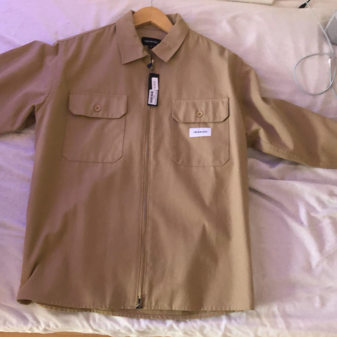 New black höst jacka