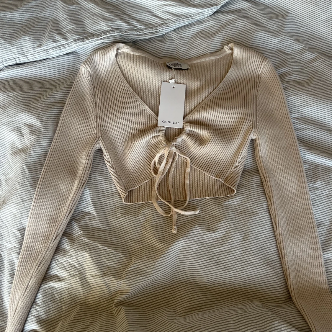 Begie stickad tröja Chiquelle - 90