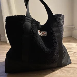 Vintage champion tote - Säljer min skitsnygga vintage Champions tote bag i nyskick till träning 