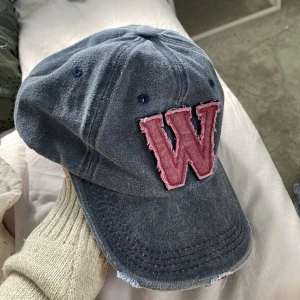 Keps  - Fin keps. Det är meningen att den ska se sliten ut!