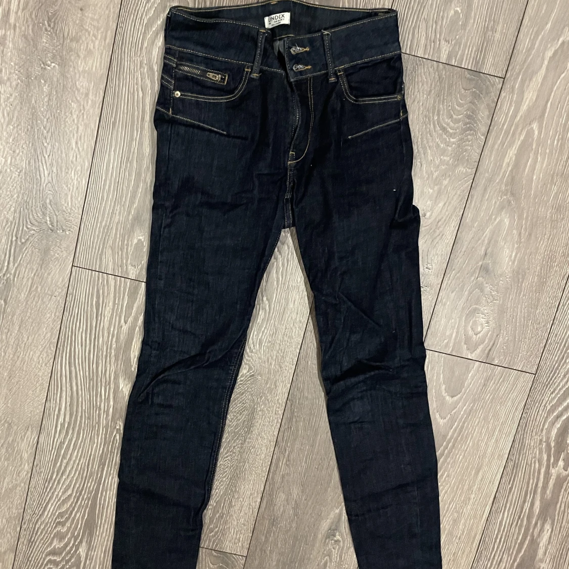 Två par mörkblå jeans 146/152