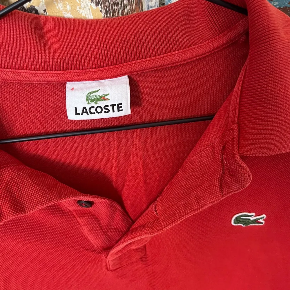 Lacoste shirt red in size Small. T-shirts.