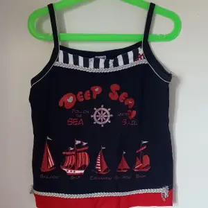 True to size. A 90s style tank top if you can style it!. 