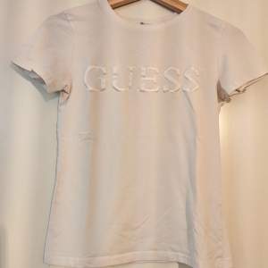 White T-Shirt. Used occasionally. It has some small imperfections, hence the price.