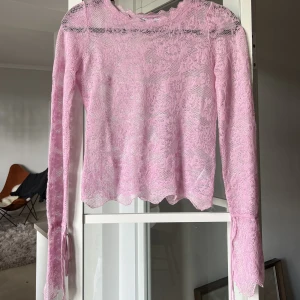 Spetstopp med vidare ärm  - Fin rosa spetstopp, använd en gång! 