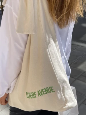 Djerf Avenue Terry Tote Bag - Djerf Avenue Terry Tote bag  Used only a couple of times, just creased from being stored away   1 very faint small stain you can see in third photo