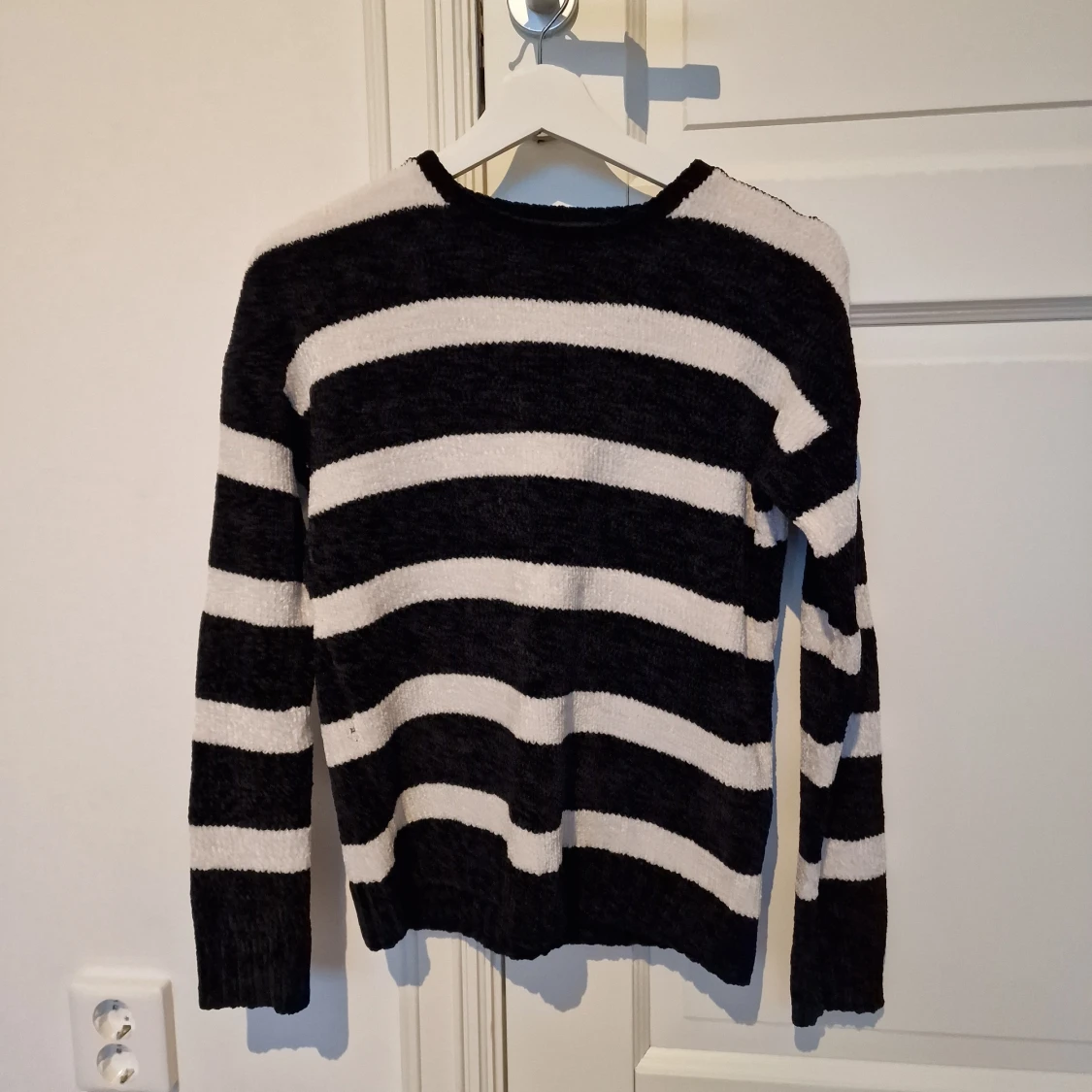 Stickad tröja i chenille