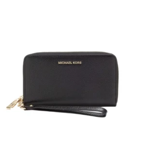 Michealkors plånbok/liten väska - Intressekoll!! Knappt använd och i fint skick, kan skicka egna bilder! Kom med prisförslag 