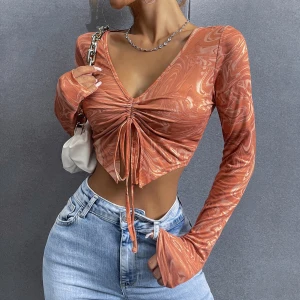 Marmortryck lång armad topp - Orange Marmortryck lång armad topp från SHEIN, storlek xs.