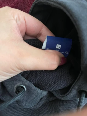 Nike tröja - En svart nike hoddi 