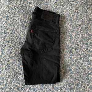Levi's 512TM  - I princip oanvända jeans. Modell 512TM herr, men passar även till dam.  W30 L30