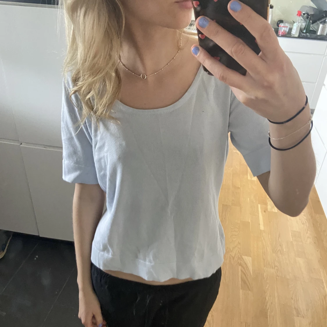 Blå stickad t-shirt