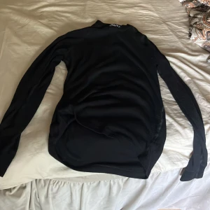 Svart underställ  - Enkelt svart underställ, skönt och tunt material