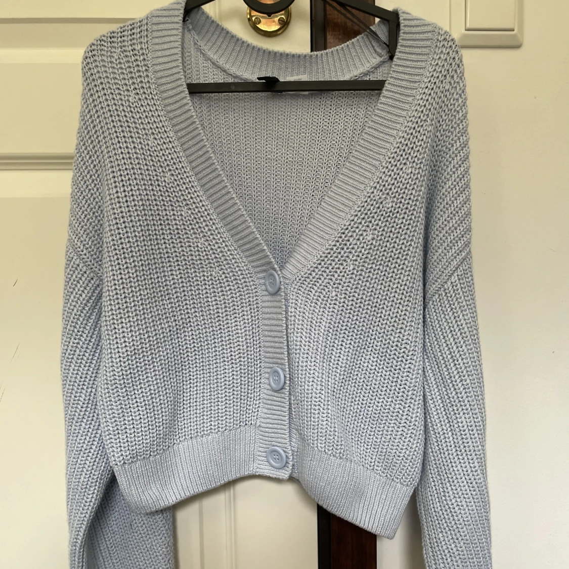 Ljusblå cardigan