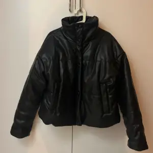 Faux leather puffer jacket.  Nakd  Bra skick 