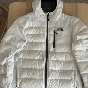 The North Face white puffer jacket - Size L, good condition