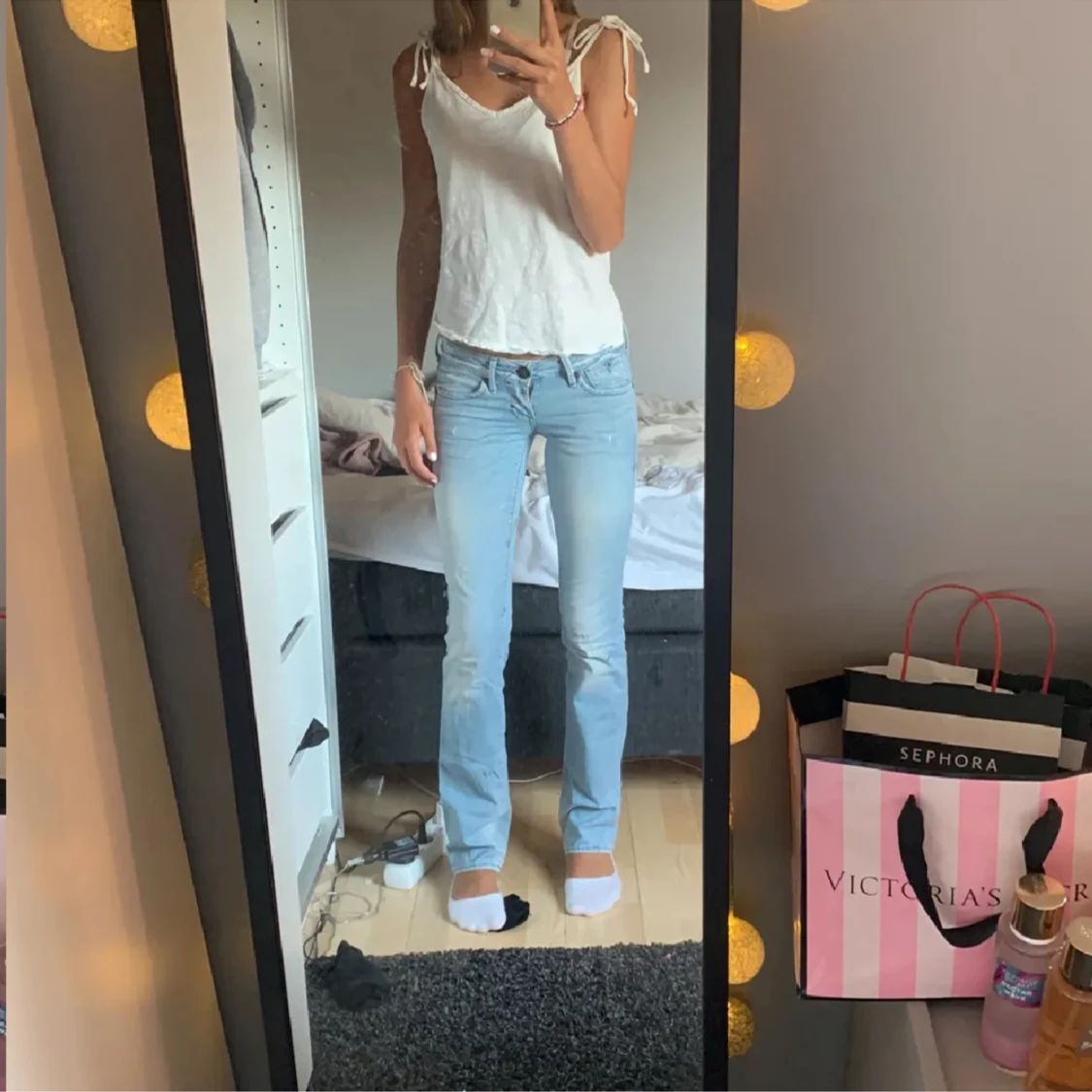 Lågmidjade ljusblåa bootcut jeans - 90