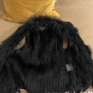 Väst  - Kanin päls storlek 36 av märket Hollies