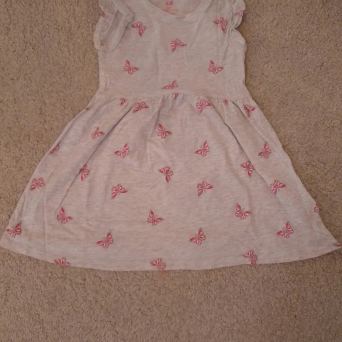 En perfekt bomulls klänning för tjejer mellan 2-4 