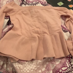 Rosa tröja utan axlar - Utan axlar 